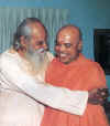 with_swami_satchidananda.jpg (100965 bytes)